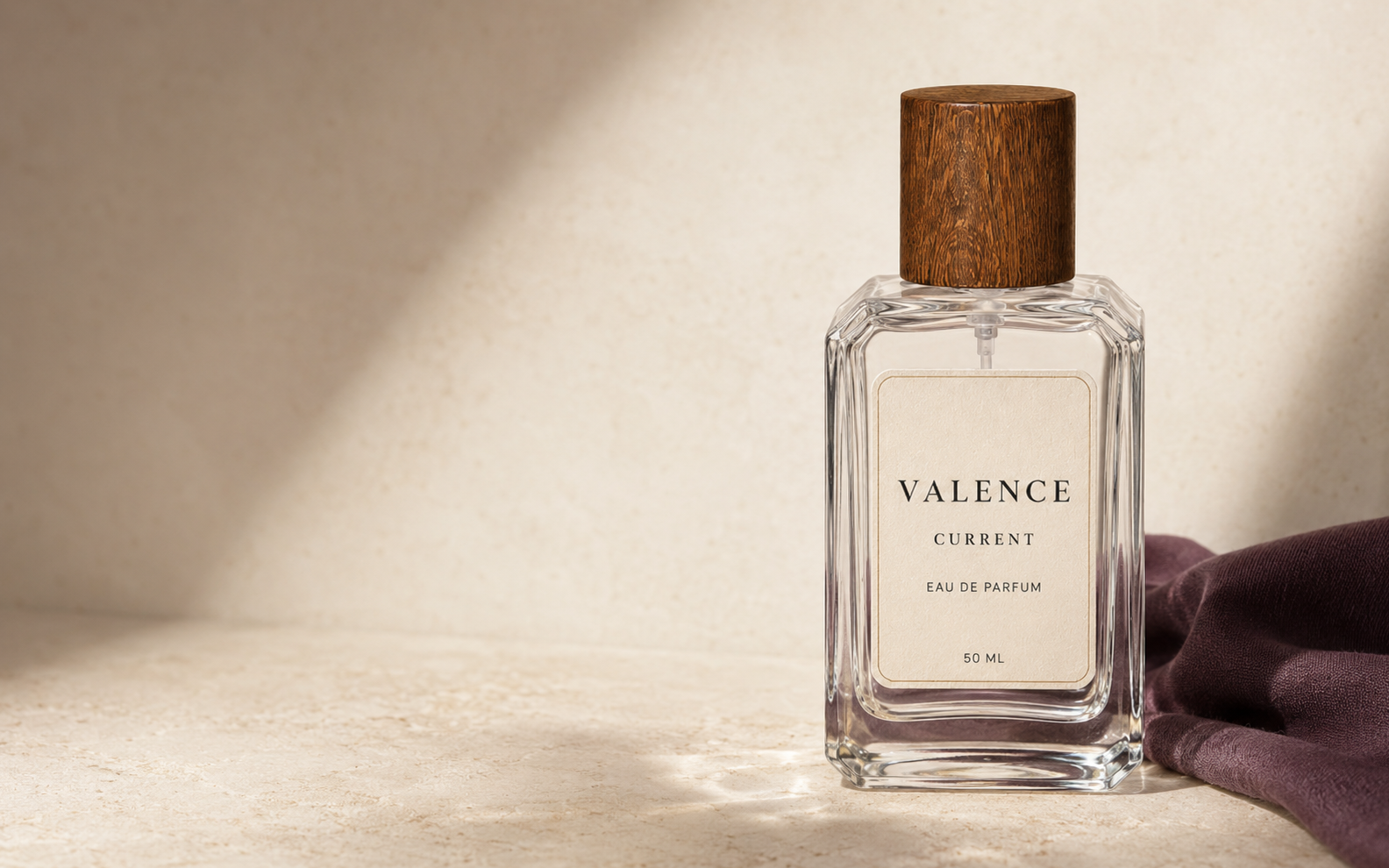 VALENCE clear glass perfume bottle with a wood-look cap and ivory label